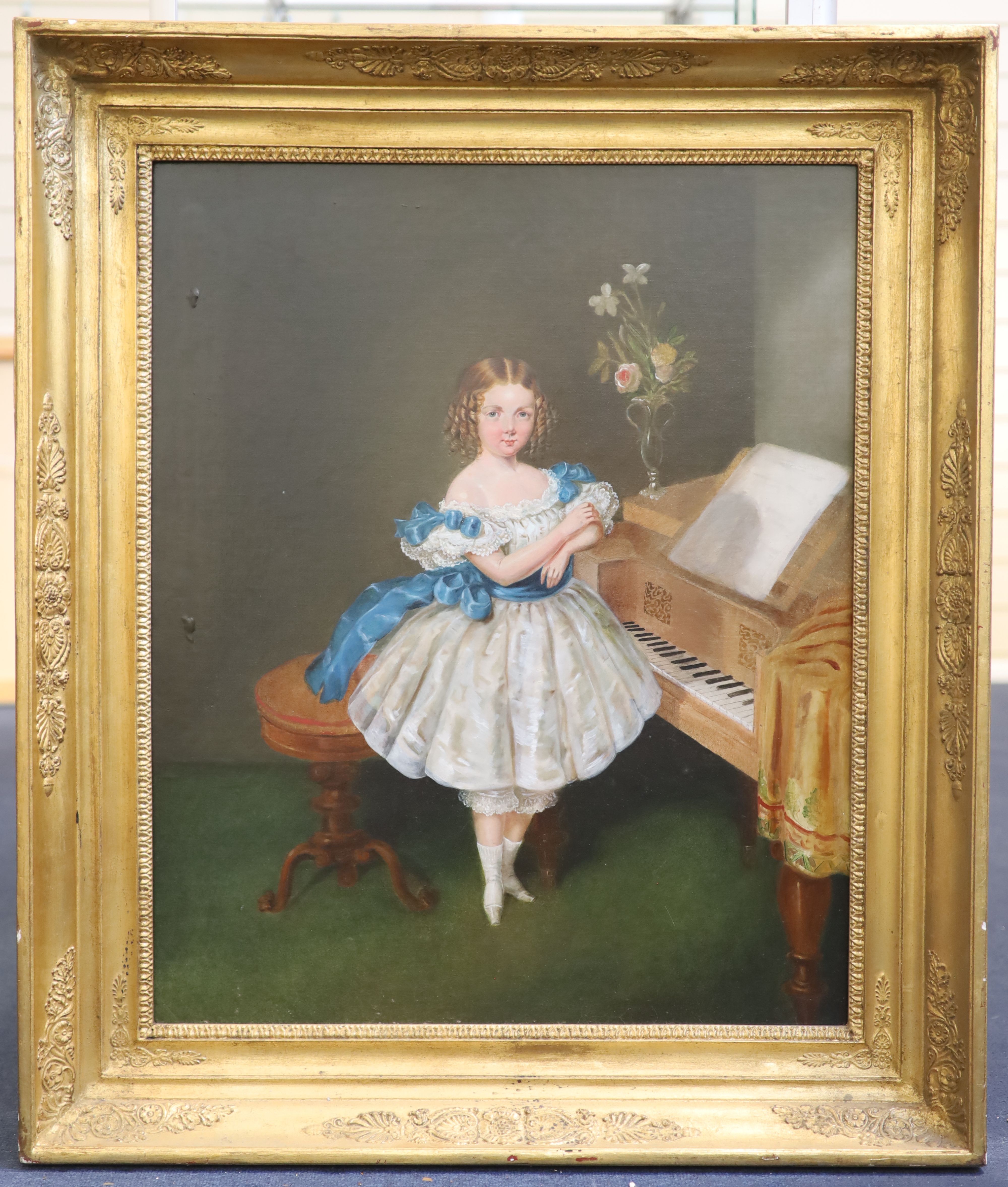 Mid 19th century Continental School Full length portrait of a girl wearing a blue and white dress standing before a piano forte 29.5 x
